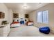 Charming bedroom with twin beds, stylish artwork, and a cozy atmosphere, perfect for restful nights and relaxation at 917 W 129Th Pl, Denver, CO 80234