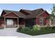 Charming single-Gathering home with dark red siding, a stone foundation and a black garage at 917 W 129Th Pl, Denver, CO 80234