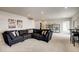 Expansive living room with a cozy seating area, tasteful decor, and ample space for entertaining guests and relaxation at 917 W 129Th Pl, Denver, CO 80234