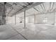 Large unfinished basement with concrete floor and support beams ready for customization at 6664 Merrimack Dr, Castle Pines, CO 80108