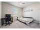 Bright bedroom features window with blinds, carpet, and bed at 6664 Merrimack Dr, Castle Pines, CO 80108