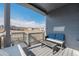 Outdoor patio with comfortable seating and beautiful views of the surrounding neighborhood at 6664 Merrimack Dr, Castle Pines, CO 80108