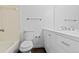 Bright bathroom with white fixtures, tile accents, and modern finishes offering a clean and updated look at 7220 S Gaylord St # G17, Littleton, CO 80122