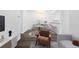 Dining room features stylish seating, modern chandelier, and a breakfast bar at 7220 S Gaylord St # G17, Littleton, CO 80122