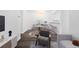 Bright living room features modern decor and hardwood flooring with a breakfast nook at 7220 S Gaylord St # G17, Littleton, CO 80122