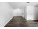 Large living area with hardwood floors, bright white walls and lots of natural light at 7220 S Gaylord St # G17, Littleton, CO 80122
