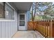 Exterior view of a fenced-in patio and back entrance to the home at 7220 S Gaylord St # G17, Littleton, CO 80122