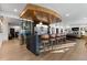 Entertain in style with a custom bar, wine storage, pendant lighting, and seating in this spacious entertaining space at 948 Buffalo Ridge Rd, Castle Pines, CO 80108