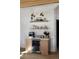 Dedicated coffee bar area featuring custom cabinetry, built-in wine fridge, and stylish decor, offering a cozy retreat at 948 Buffalo Ridge Rd, Castle Pines, CO 80108