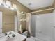 Full bathroom with shower-tub combination and a single sink vanity at 5660 S Eaton St, Littleton, CO 80123