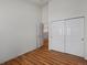Bedroom with white walls and sliding-door closet at 5660 S Eaton St, Littleton, CO 80123
