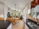 Bright kitchen with an eat-in area that flows into an open-concept living space at 5660 S Eaton St, Littleton, CO 80123