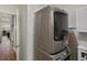 Laundry room with stacked washer and dryer at 5660 S Eaton St, Littleton, CO 80123