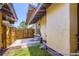 Backyard showcasing the patio, fencing, and exterior wall of the home at 3750 S Fairplay Way, Aurora, CO 80014