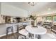 Cozy dining area adjacent to the kitchen, perfect for casual meals and entertaining, with natural light at 3750 S Fairplay Way, Aurora, CO 80014