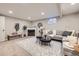 Cozy living room with fireplace, plush seating, and stylish decor at 3750 S Fairplay Way, Aurora, CO 80014