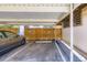 Carport providing covered parking with designated spaces and wooden fencing at 3750 S Fairplay Way, Aurora, CO 80014