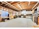 Unfinished basement with exposed wood framing, perfect for customization at 27655 E Moraine Dr, Aurora, CO 80016