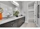 Bathroom boasts dual sinks, granite counters and tiled shower/tub combo at 27655 E Moraine Dr, Aurora, CO 80016