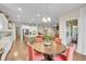 Open concept kitchen, dining and living areas create a bright and welcoming home at 27655 E Moraine Dr, Aurora, CO 80016