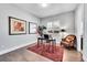 Bright home office space with hardwood floors and natural light at 27655 E Moraine Dr, Aurora, CO 80016