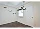 Bedrooom boasts hardwood floors, a window that brings in lots of light and floating shelves for storage at 7185 S Gaylord St # A, Littleton, CO 80122