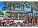 Exterior view of a gazebo with picnic tables and a grill at 7185 S Gaylord St # A, Littleton, CO 80122