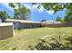 Large grassy backyard with shed, patio, and hot tub at 2279 S Lewiston St, Aurora, CO 80013