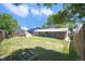 Well-maintained backyard with patio, hot tub, shed, and wood fence at 2279 S Lewiston St, Aurora, CO 80013