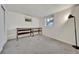 Bright bedroom with closet, shelving, and natural light from two windows at 2279 S Lewiston St, Aurora, CO 80013