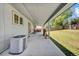 Covered patio with space for outdoor seating, grilling, and relaxing in the backyard at 2279 S Lewiston St, Aurora, CO 80013