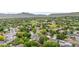 An aerial shot of a mature neighborhood with well-maintained landscaping at 13052 W Asbury Pl, Lakewood, CO 80228