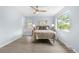 Serene bedroom with bright light and comfortable decor at 13052 W Asbury Pl, Lakewood, CO 80228