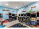 Basement game room with video arcade games at 2627 Hillcroft Ln, Castle Rock, CO 80104