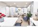 Bright living room featuring neutral furnishings and stylish decor at 1606 W 166Th Ave, Broomfield, CO 80023