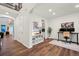 Inviting foyer showcasing hardwood floors and an open floor plan at 19973 W 94Th Ln, Arvada, CO 80007