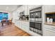 Modern appliances, including ovens and gas range, in a well-designed kitchen at 19973 W 94Th Ln, Arvada, CO 80007