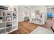 Open living room with stylish decor, hardwood floors, and ample space at 19973 W 94Th Ln, Arvada, CO 80007