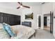 Cozy bedroom with a comfortable bed, stylish decor, and ample closet space, creating a relaxing retreat at 8370 W Evans Pl, Lakewood, CO 80227