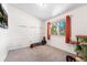 Bedroom featuring a large window and red curtains at 8370 W Evans Pl, Lakewood, CO 80227