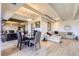 Open layout of dining area and living room creating an inviting and airy atmosphere at 7877 E Mississippi Ave # 506, Denver, CO 80247