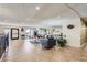 Large lobby with tile floor, recessed lighting, seating area, and mirrored wall feature at 7877 E Mississippi Ave # 506, Denver, CO 80247