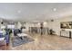Well-lit building lobby featuring neutral decor, comfortable seating, and an elevator at 7877 E Mississippi Ave # 506, Denver, CO 80247