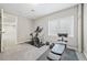 Finished basement features a modern stationary bike and weight training area at 10052 Sage Sparrow Ct, Highlands Ranch, CO 80129