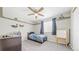 Cozy bedroom with carpet flooring, ceiling fan, and window at 10052 Sage Sparrow Ct, Highlands Ranch, CO 80129