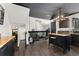 View of kitchen island, looking toward the living room and staircase at 96 S Lindsey St, Castle Rock, CO 80104