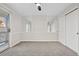 Bright bedroom with mirrored wall and sliding door to balcony at 165 S Sable Blvd # R14, Aurora, CO 80012