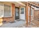 Exterior view showing building entrance and landscaping at 165 S Sable Blvd # R14, Aurora, CO 80012