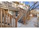 Exterior view of condo building with stairs and patio area at 165 S Sable Blvd # R14, Aurora, CO 80012