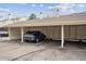 Carport view with covered parking area at 4117 S Mobile Cir # C, Aurora, CO 80013